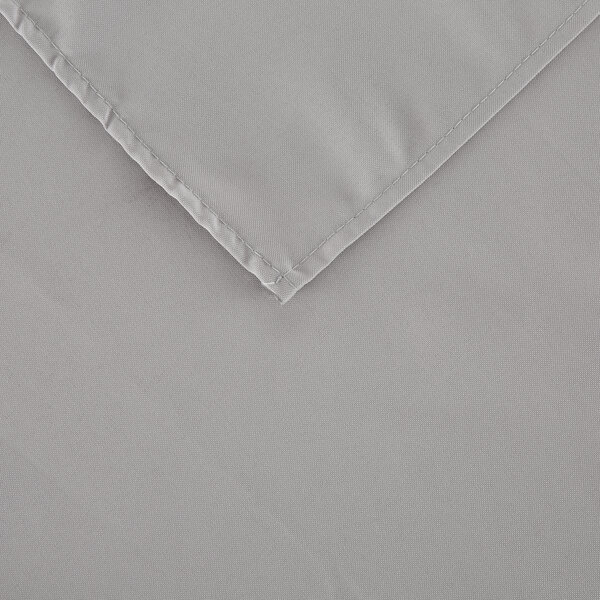 A close up of a gray hemmed square polyester table cover.