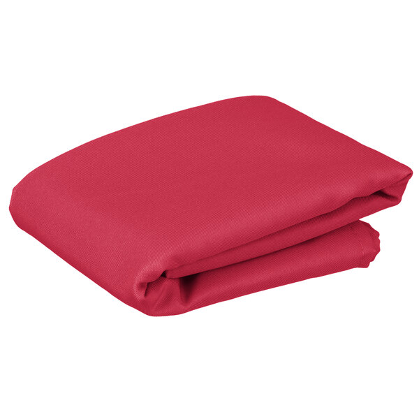 A stack of folded hot pink Intedge table covers.