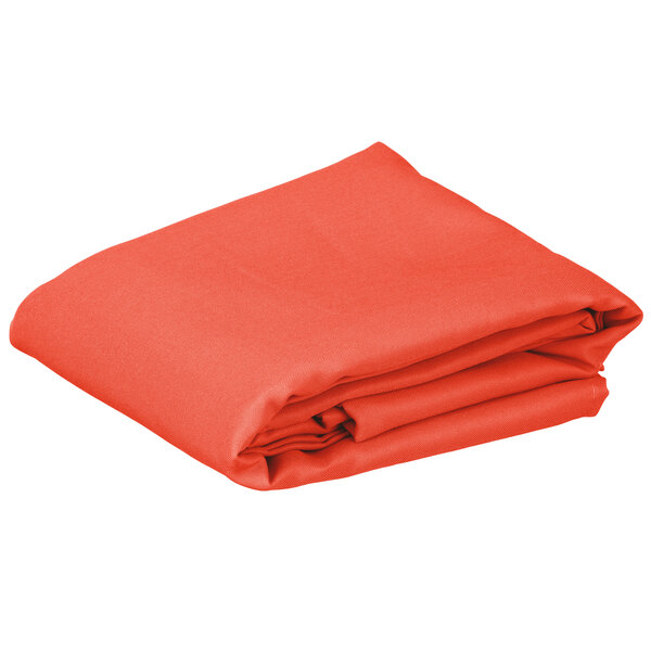 An orange folded rectangular table cover on a white background.