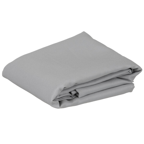 A folded grey rectangular cloth table cover.