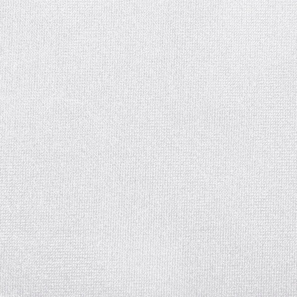 A close-up of a white spandex table cover with a small hole in it.