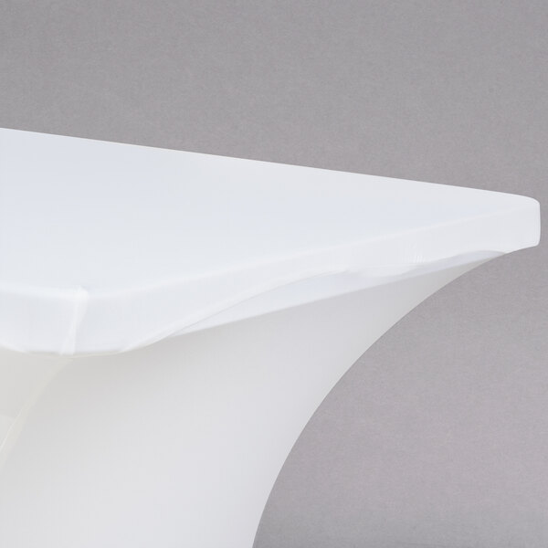 A white table top with a white Snap Drape Contour Cover.