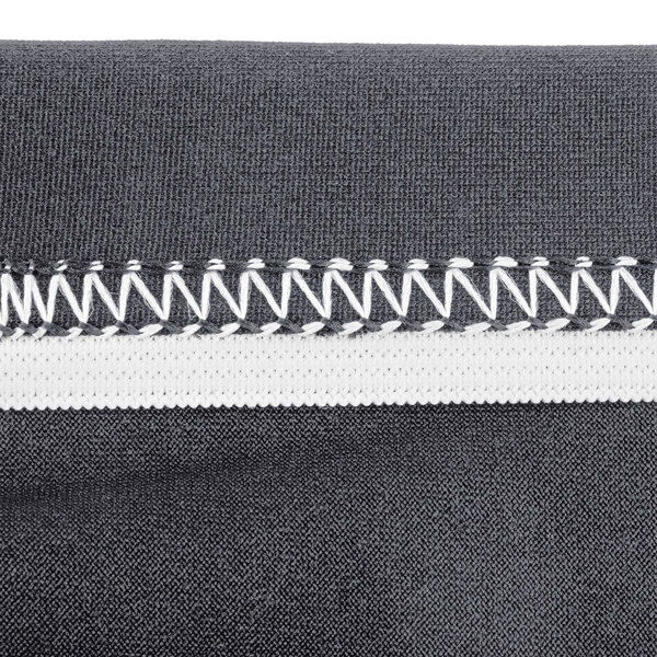 A close up of a charcoal spandex table cover with a zipper.