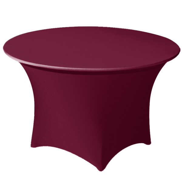 A burgundy Snap Drape spandex table cover on a round table.