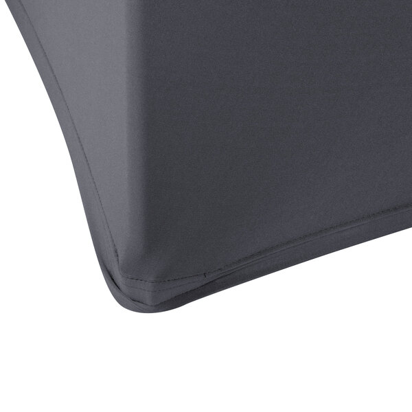 A black Snap Drape spandex table cover on a round table.