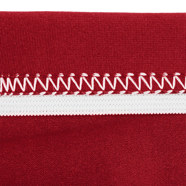 A close up of a crimson Snap Drape spandex table cover.