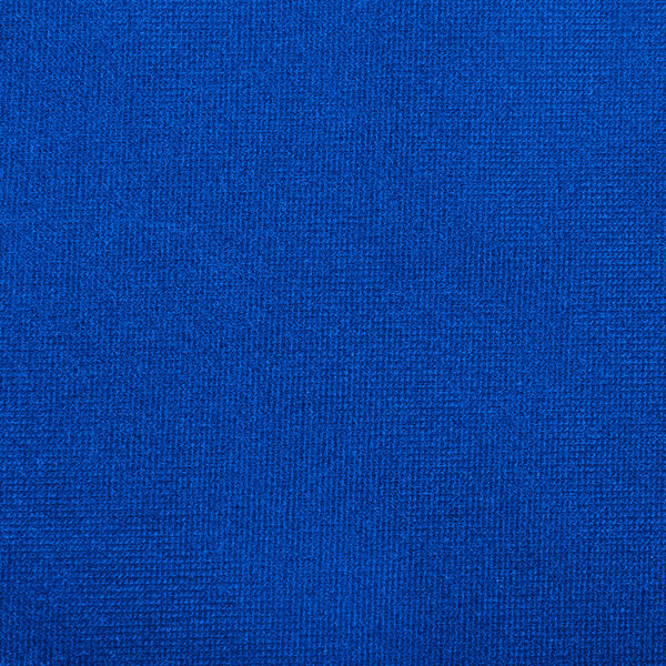 A close-up of a royal blue spandex fabric.