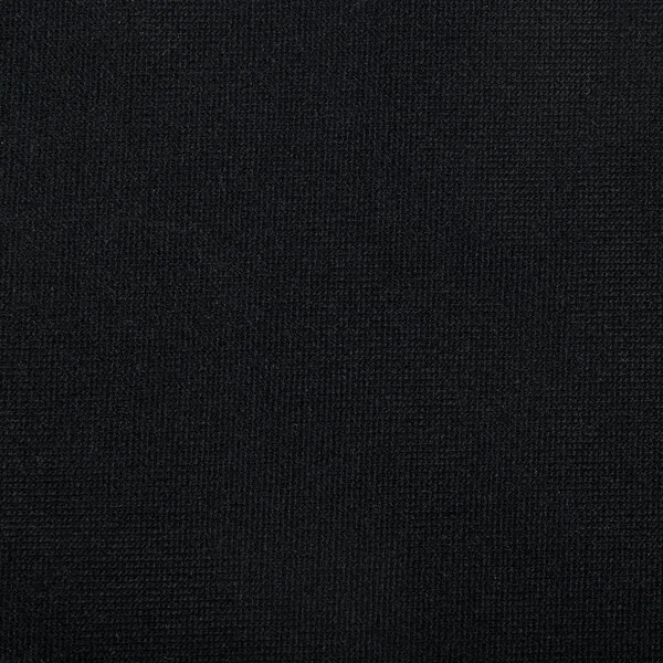 A close-up of a black fabric with a white background.
