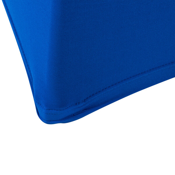 A close up of a royal blue spandex table cover.