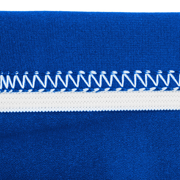 A close up of a royal blue spandex table cover.