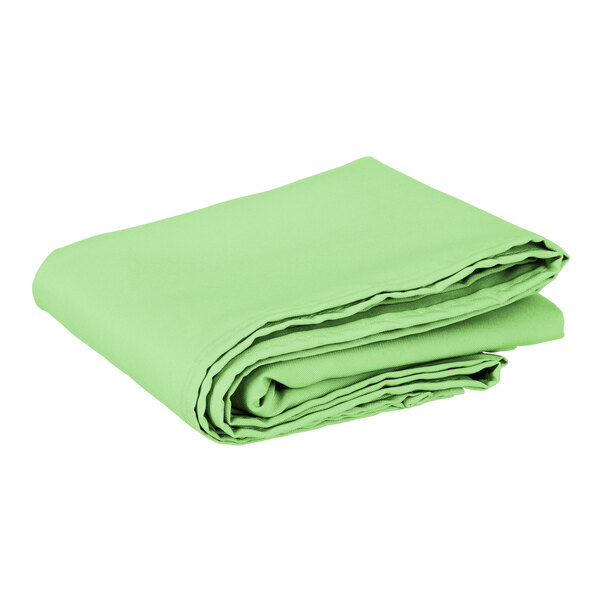 A folded, square seafoam green polyester hemmed cloth table cover.