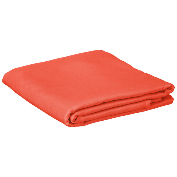 An orange folded Intedge square table cover on a white background.