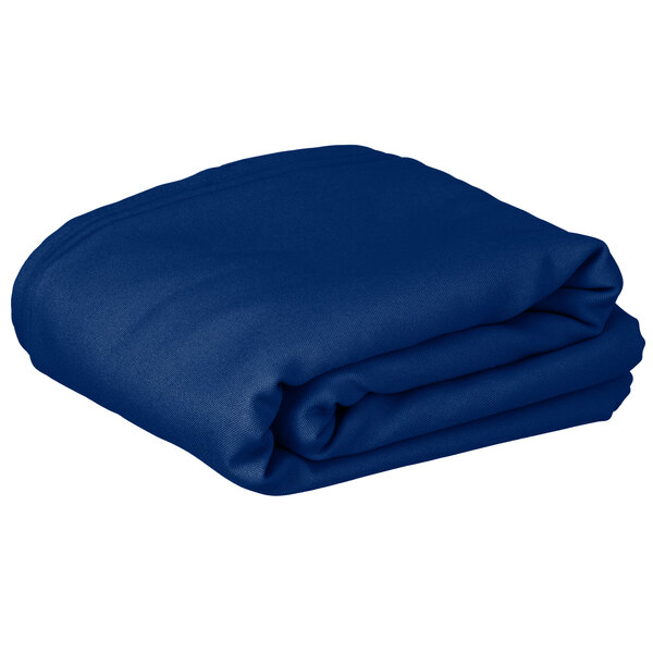 A folded royal blue rectangular table cloth.