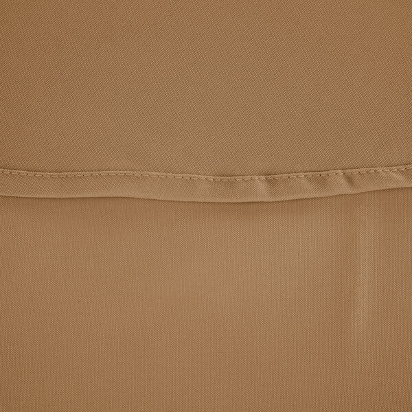 A close-up of a stitched beige fabric.