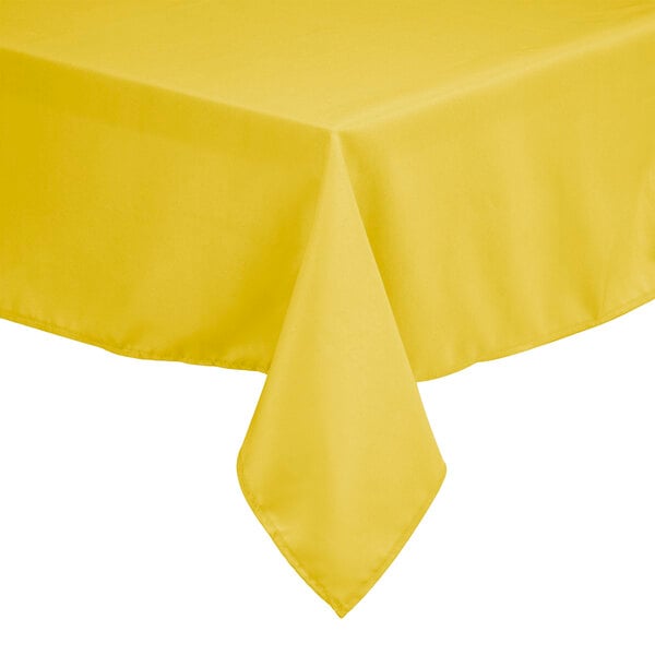 A yellow 100% polyester square table cover by Intedge.