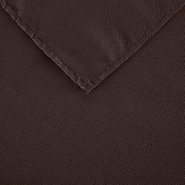 A brown rectangular cloth table cover with hemmed edges on a table.