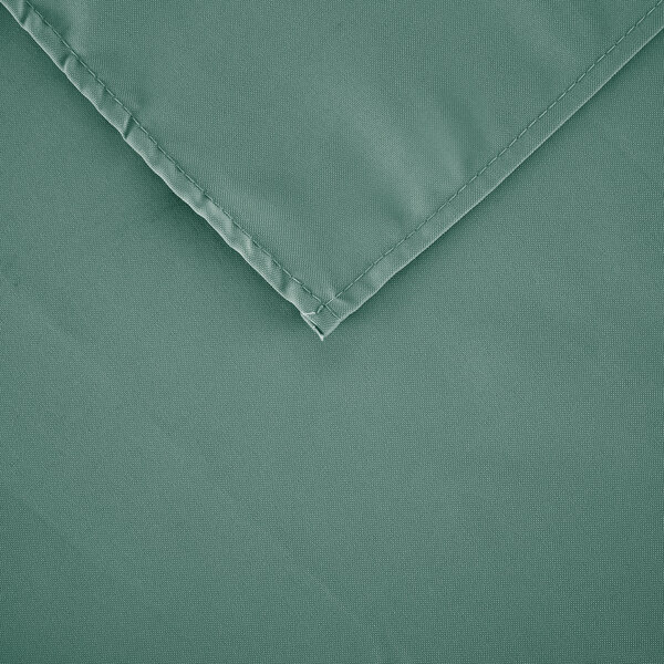 A seafoam green rectangular fabric table cover with a folded edge.
