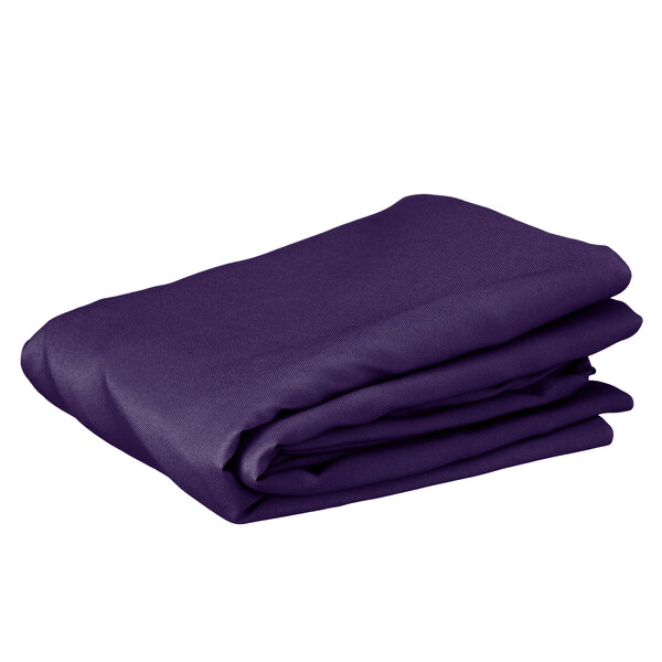 A folded purple round table cover on a white background.