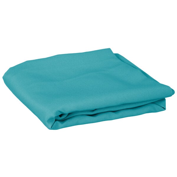 A folded teal Intedge table cover on a white background.
