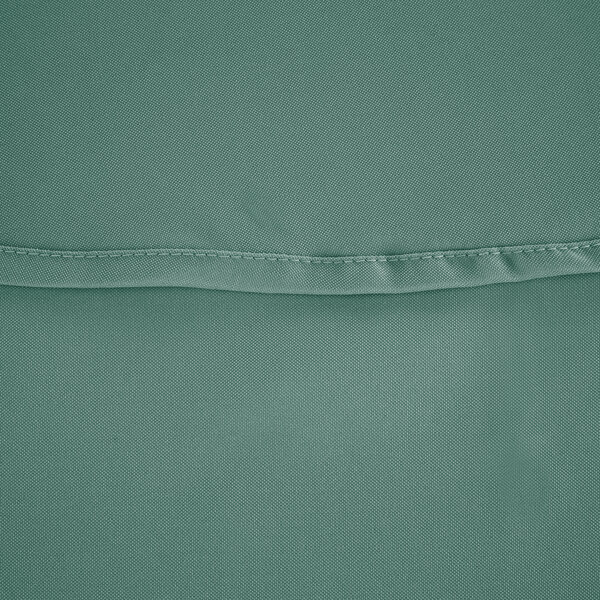 A close up of a seafoam green fabric with a white hem.
