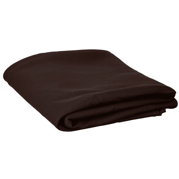 A folded brown Intedge 72" round cloth table cover.
