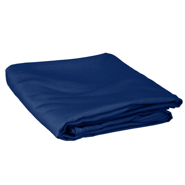 A folded royal blue Intedge table cover.