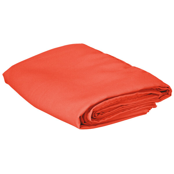 An orange Intedge square table cover folded on a white background.