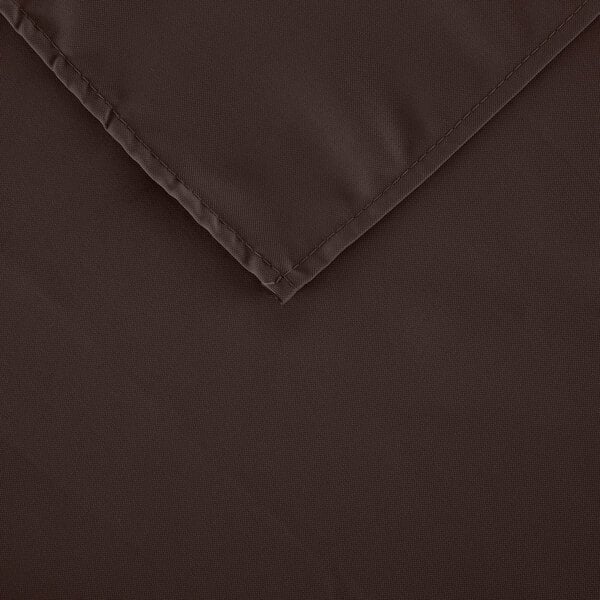 A brown square Intedge cloth table cover with a corner.