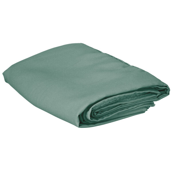 A folded seafoam green Intedge square table cover.