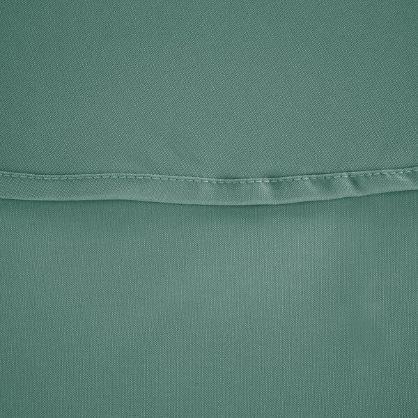 A close-up of a seafoam green polyester table cover with a hemmed edge.