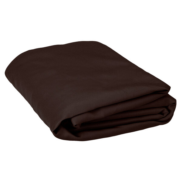 A folded brown Intedge round table cover.