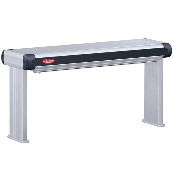 A metal Hatco Glo-Ray strip warmer with a black and red handle.