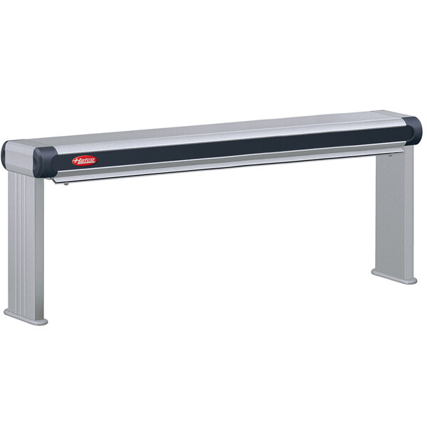 A long metal rectangular strip with black ends and a black and red handle.