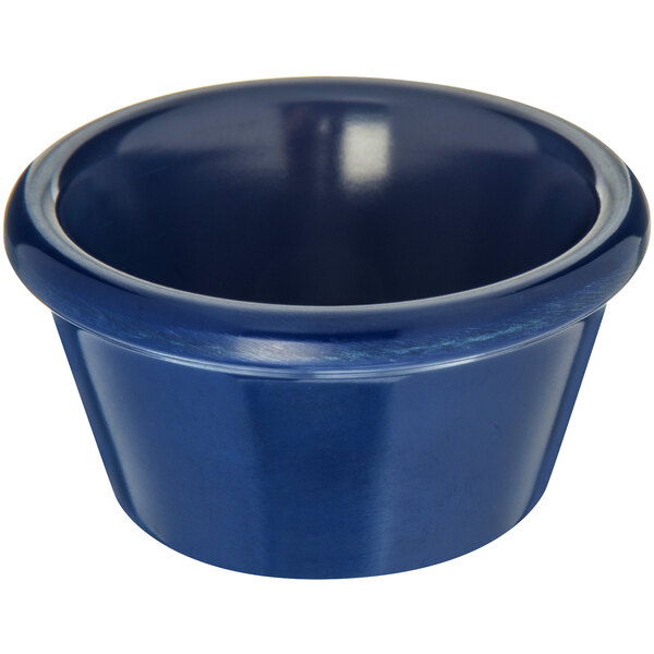 A Carlisle cobalt blue melamine ramekin on a white background.