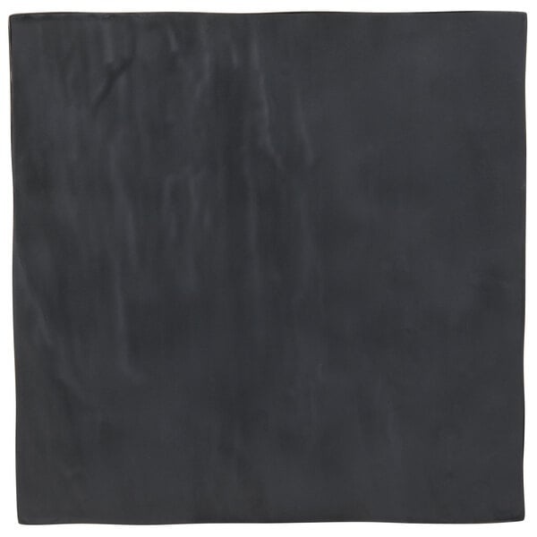 A black square surface with white lines.