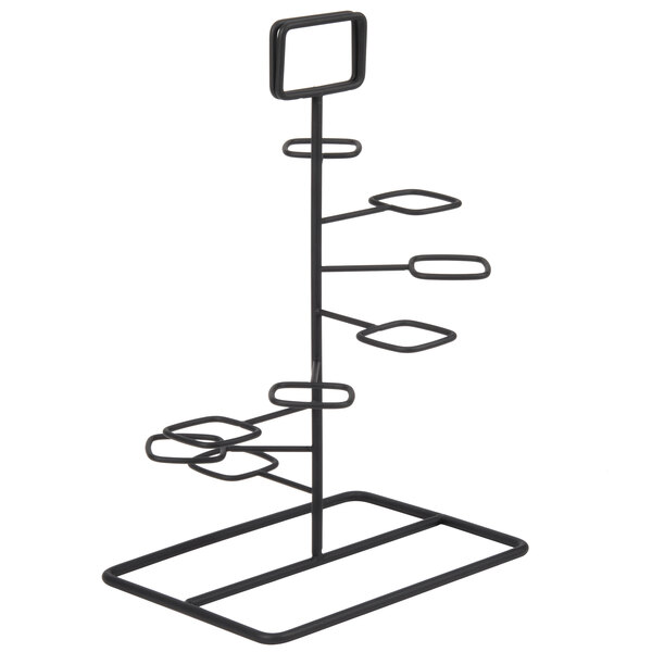 A black wire stand with six square holes.