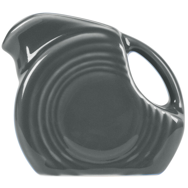 A grey Fiesta® mini pitcher with a handle.