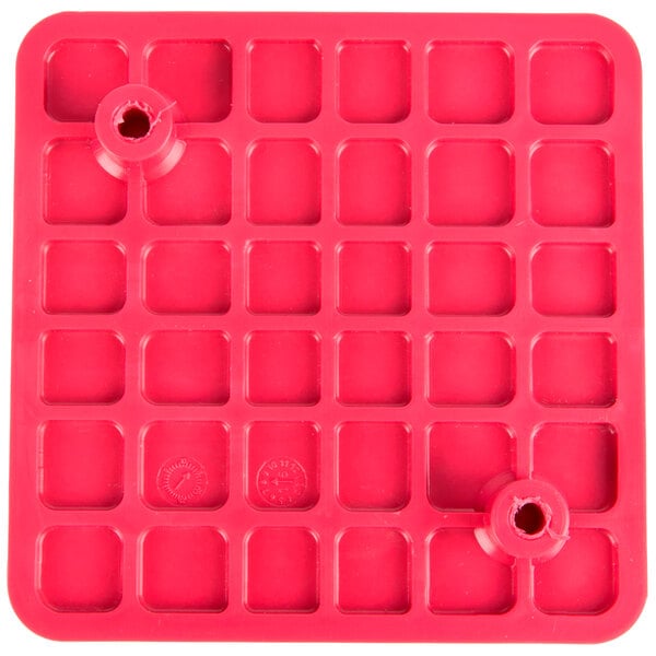 A red square Nemco push block with holes in it.