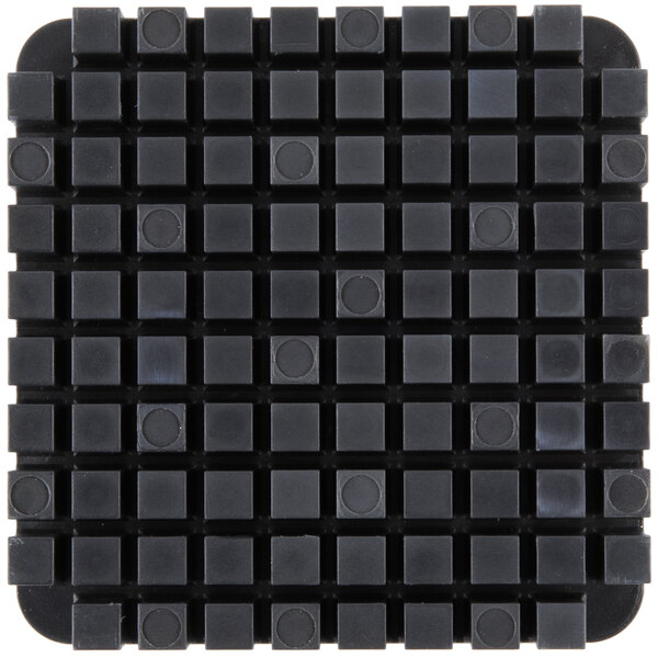 A black square Nemco push block with many small squares.