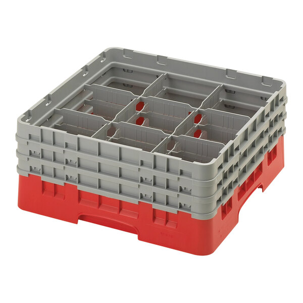 A red and gray plastic Cambro glass rack with six compartments.