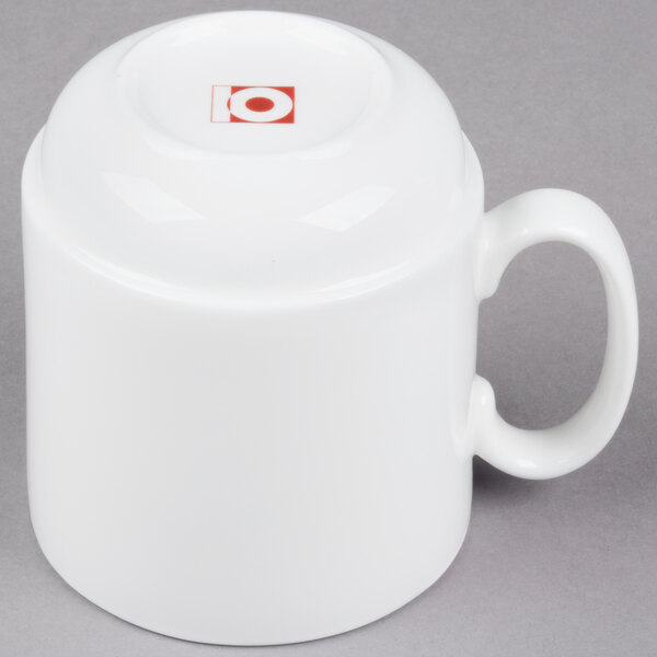 A 10 Strawberry Street white bone china espresso cup and saucer set.