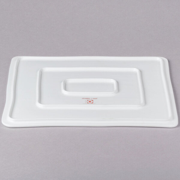 A white rectangular object with a wood grain design.