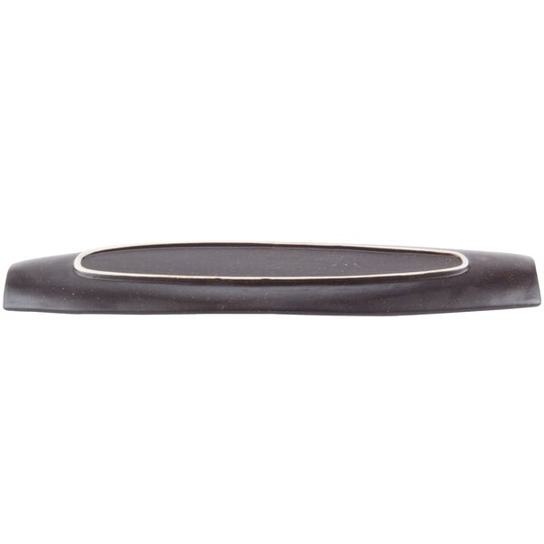A black rectangular stoneware platter with a silver line.