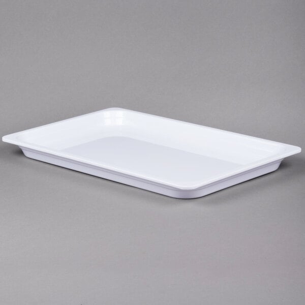 A white rectangular Thunder Group melamine food pan.