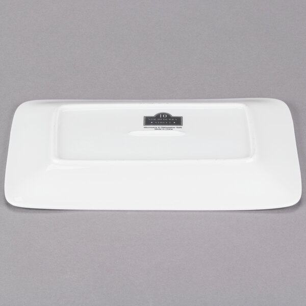 A white rectangular porcelain platter with the 10 Strawberry Street logo on it.