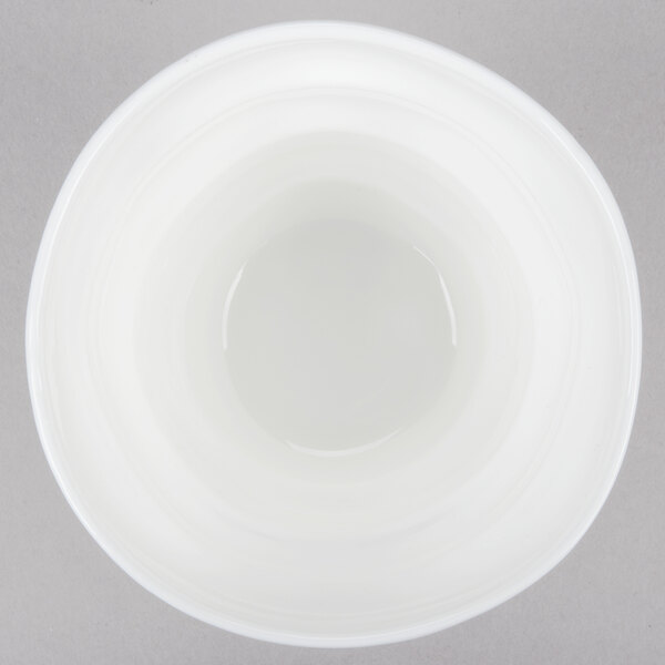 A close-up of a 10 Strawberry Street Bright White Porcelain Sorbet Cup with a circular surface.