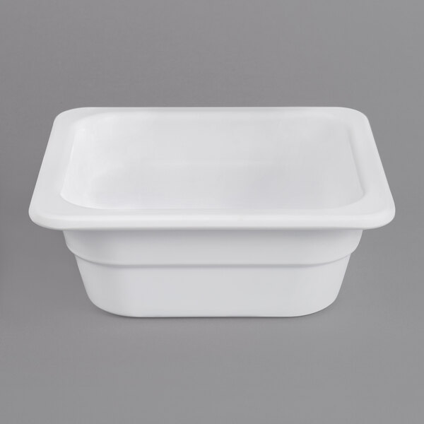 A white rectangular Thunder Group melamine food pan.