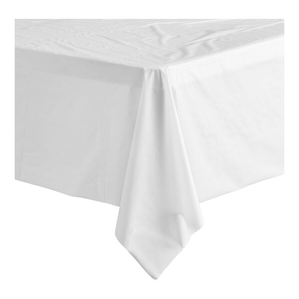 A white plastic roll table cover draped over a rectangular table.