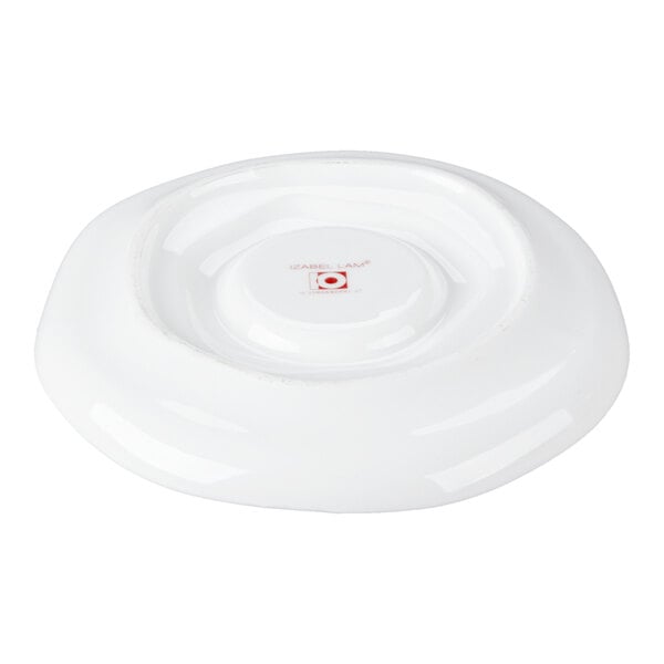 A bright white porcelain saucer with a rippled design.