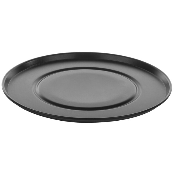 A black round Rational non-stick pizza dish with a circular rim.